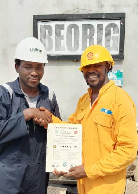 Earthoc trainees working with industrial equipment