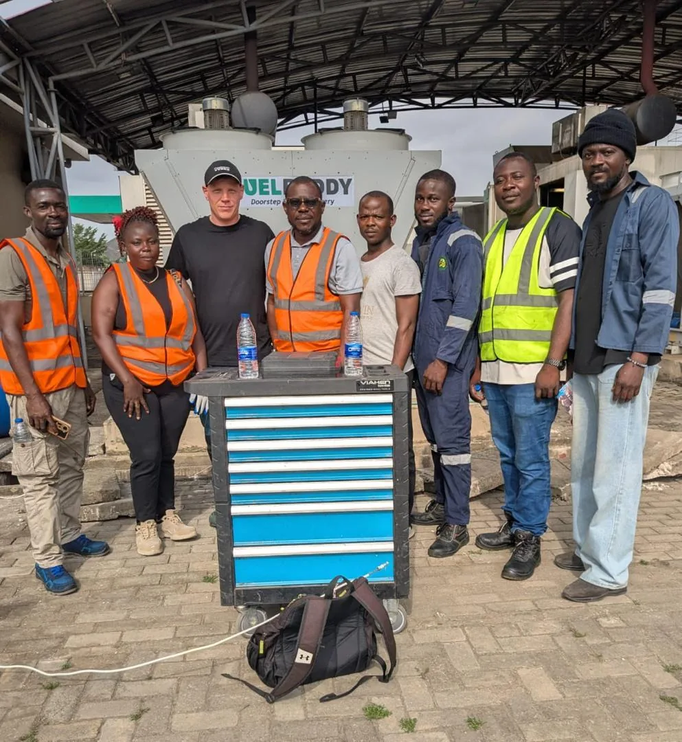 A technical workforce training team at an industrial equipment site